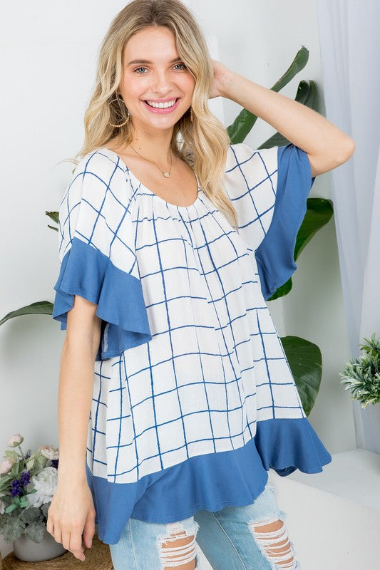 PLUS WOVEN PLAID AND SOLID JERSEY MIX RUFFLE PEASANT TOP- Plus Plaid mix ruffle peasant top- Short ruffled bell sleeves- Wear it off shoulder or as a loose scoop necCoeur de la Mode