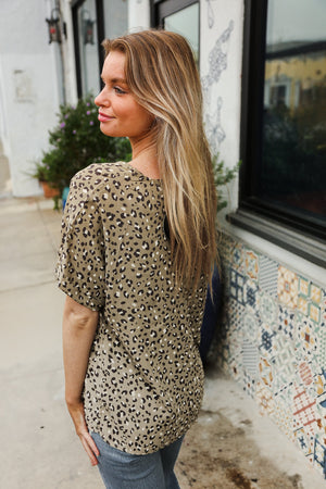 Best In Bold Sage Animal Print V Neck Dolman Side Slit Top - Coeur de la Mode