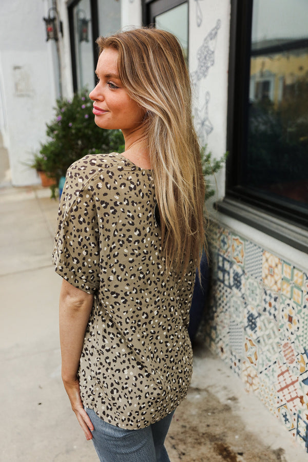 Best In Bold Sage Animal Print V Neck Dolman Side Slit Top - Coeur de la Mode