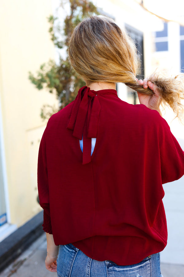 Bold Dreams Wine Smocked Three Quarter Sleeve Tie Back Top - Coeur de la Mode