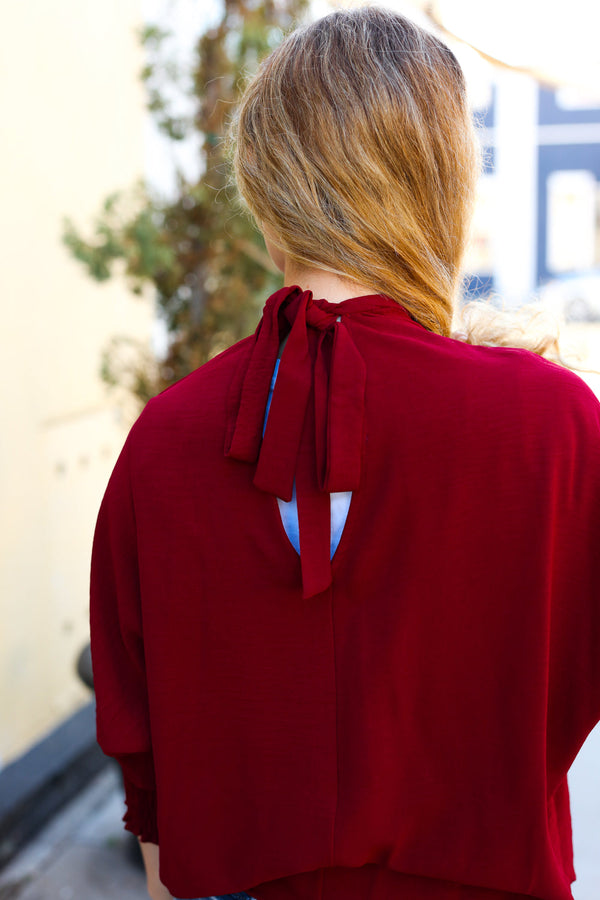 Bold Dreams Wine Smocked Three Quarter Sleeve Tie Back Top - Coeur de la Mode