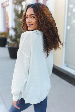 Lock Eyes Ivory Notched Neck With Patch Oversized Sweater - Coeur de la Mode
