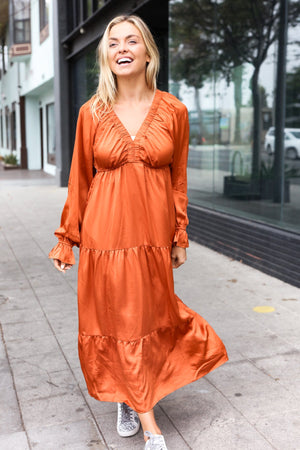Elegant Rust Elastic V Neck Tiered Satin Maxi Dress - Coeur de la Mode