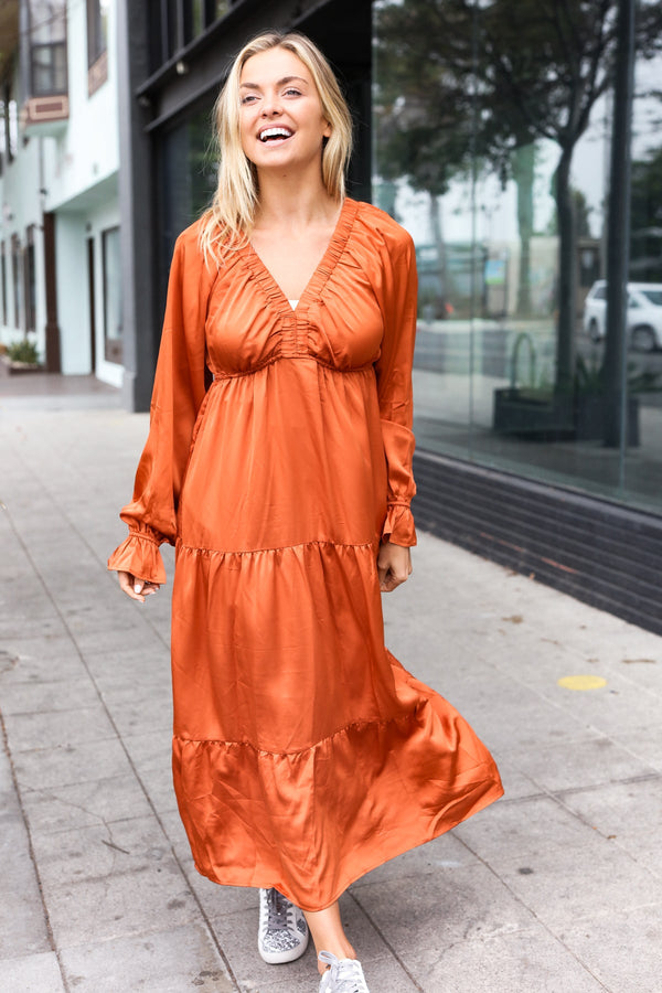 Elegant Rust Elastic V Neck Tiered Satin Maxi Dress - Coeur de la Mode