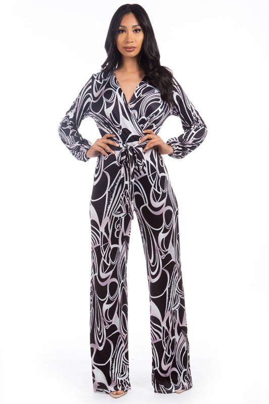 
 Effortless Elegance: Multi-Print V-Neck Jumpsuit
 Indulge in the perfect blend of sophistication and confidence with our exquisite Multi-Print V-Neck Jumpsuit. EleCoeur de la Mode