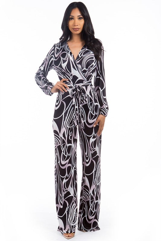 
 Effortless Elegance: Multi-Print V-Neck Jumpsuit
 Indulge in the perfect blend of sophistication and confidence with our exquisite Multi-Print V-Neck Jumpsuit. EleCoeur de la Mode