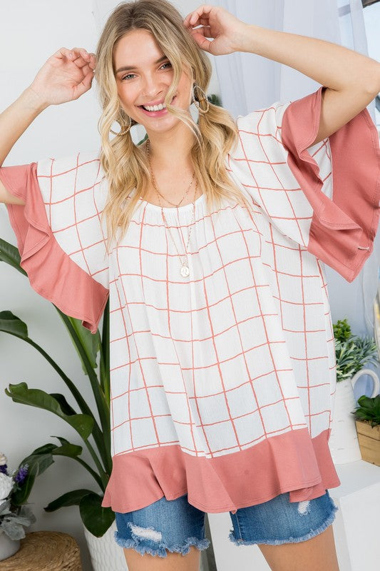 PLUS WOVEN PLAID AND SOLID JERSEY MIX RUFFLE PEASANT TOP- Plus Plaid mix ruffle peasant top- Short ruffled bell sleeves- Wear it off shoulder or as a loose scoop necCoeur de la Mode