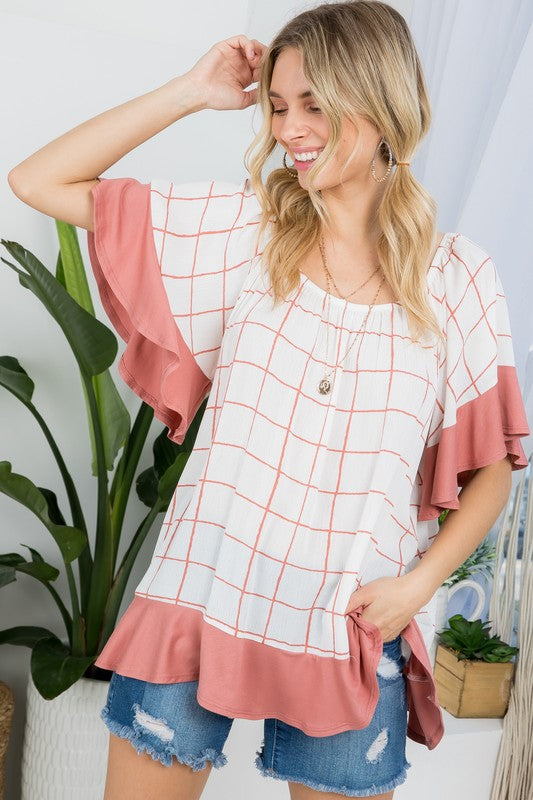 PLUS WOVEN PLAID AND SOLID JERSEY MIX RUFFLE PEASANT TOP- Plus Plaid mix ruffle peasant top- Short ruffled bell sleeves- Wear it off shoulder or as a loose scoop necCoeur de la Mode