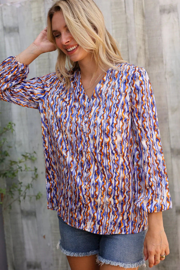 On A Wild Streak V Neck Fabric Button Detail Blouse