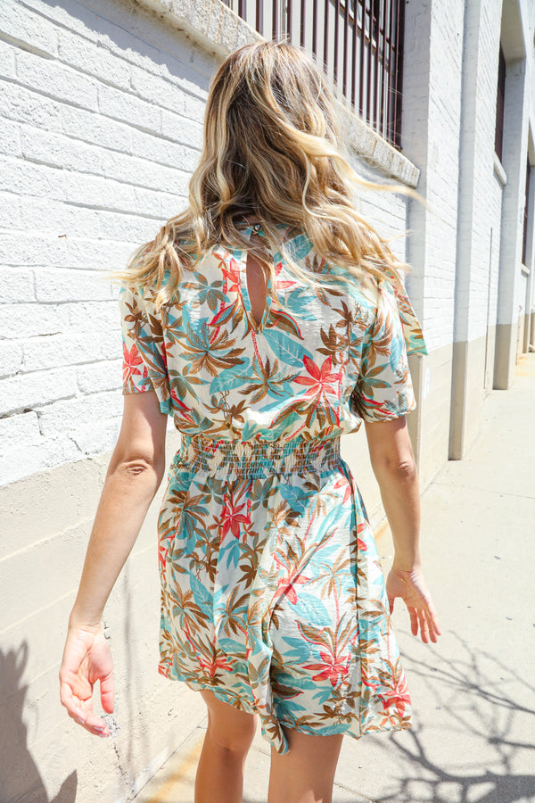 Get Whimsical Tropical Print Smocked Waist Neck Button Romper