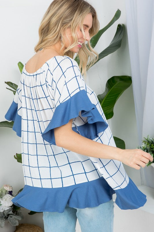 PLUS WOVEN PLAID AND SOLID JERSEY MIX RUFFLE PEASANT TOP- Plus Plaid mix ruffle peasant top- Short ruffled bell sleeves- Wear it off shoulder or as a loose scoop necCoeur de la Mode