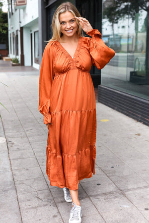 Elegant Rust Elastic V Neck Tiered Satin Maxi Dress - Coeur de la Mode
