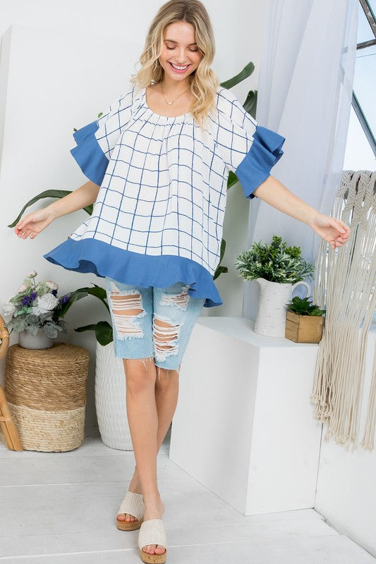 PLUS WOVEN PLAID AND SOLID JERSEY MIX RUFFLE PEASANT TOP- Plus Plaid mix ruffle peasant top- Short ruffled bell sleeves- Wear it off shoulder or as a loose scoop necCoeur de la Mode