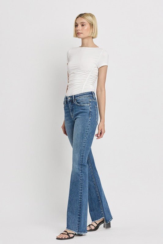 High Rise Slant Hem Flare Jeans - Coeur de la Mode