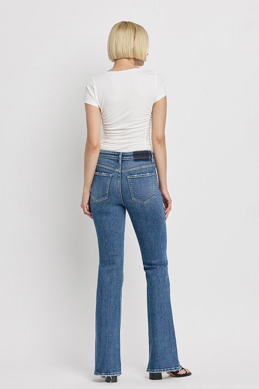 High Rise Slant Hem Flare Jeans - Coeur de la Mode