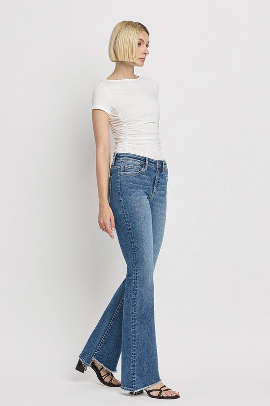 High Rise Slant Hem Flare Jeans - Coeur de la Mode