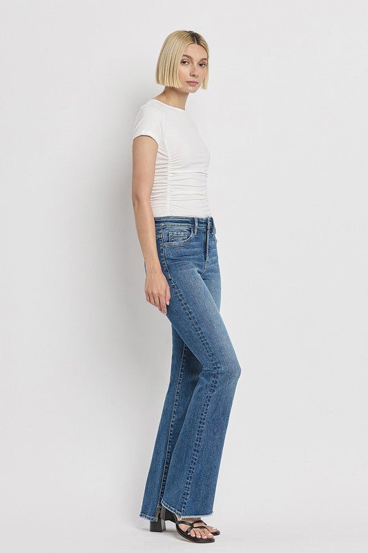High Rise Slant Hem Flare Jeans - Coeur de la Mode