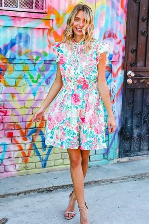 Under Your Spell Floral Smocked Flutter Sleeve Ruffle Mini Dress - Coeur de la Mode